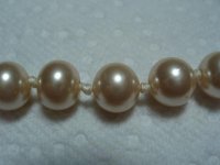 Imitation vinate Japanese strand with differently shaped pearls.jpg