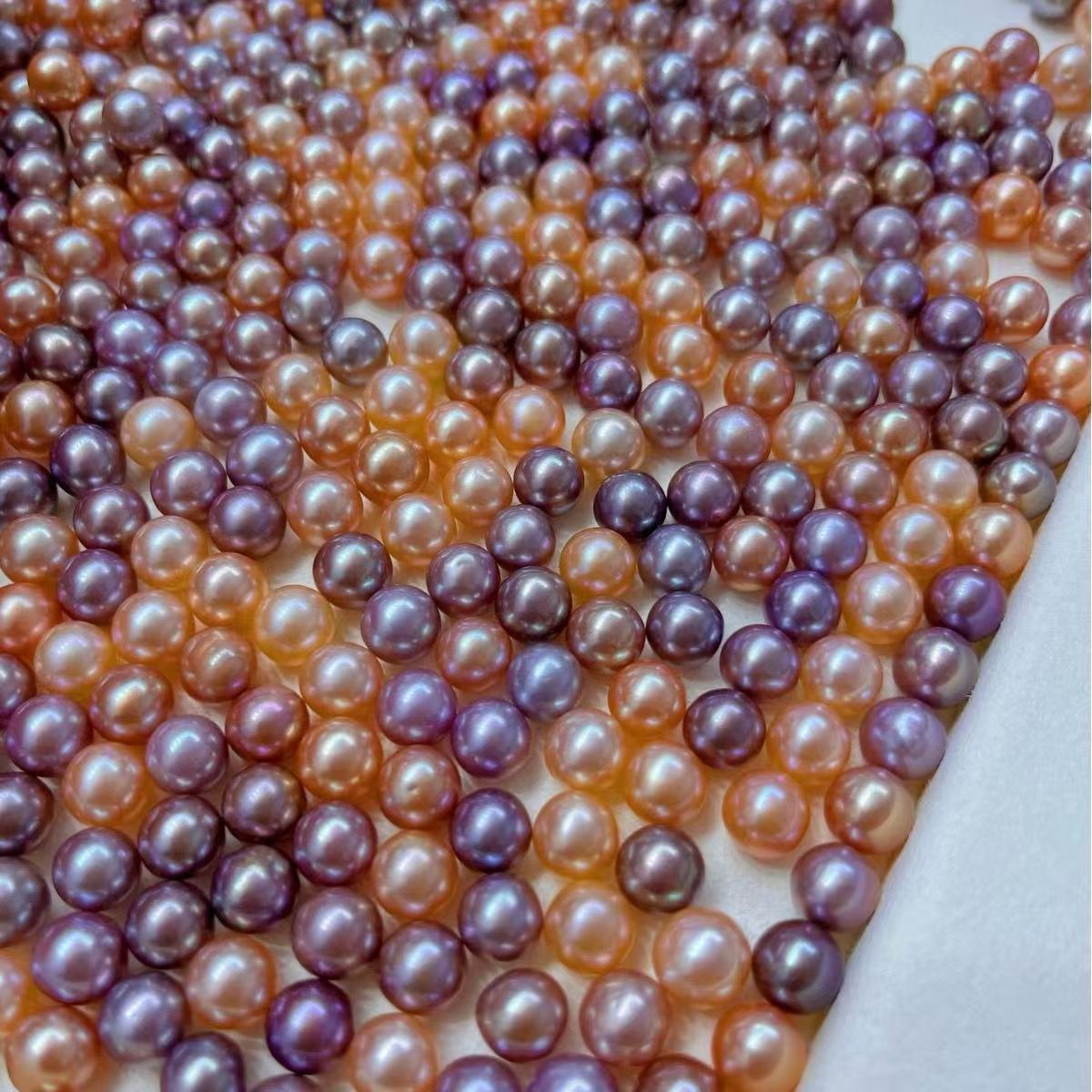 6mm round peach purple pearl.jpg