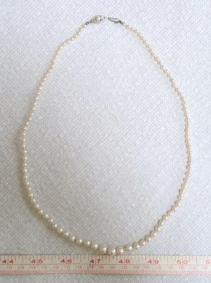 21 inch strand of graduated pearls belonged to my grandmother (born 1900)