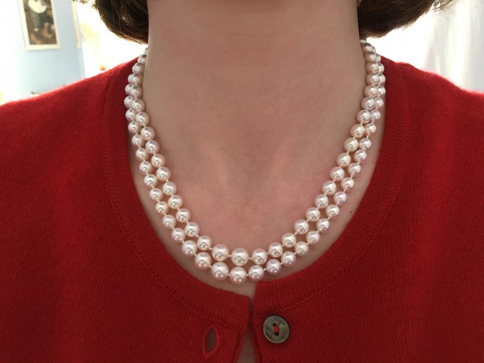 wearing double strand metallic white freshwater pearls