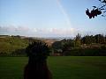 Faint rainbow framing the profile of our halau leader.