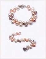 freshwater_button_pearl_bracelet_by_sarahorsomeone-d5pfz6d.jpg