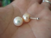 button and round pearls in hand 9-9.jpg