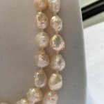 two cream colored rosebud/drusy strands from Catherine Cardellini