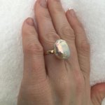 custom souffle pearl ring from Hisano on hand at angle