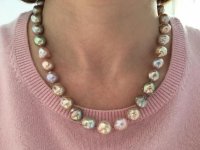 Ripple pearl strand pink sweater