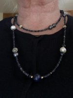 wearing - a faceted sapphire necklace I never wore so I took it apart and added mixed metal beads and freshwater white and gray pearls as well as some lapis. Little tiny diamond cut beads plus the sapphires make the necklace sparkle