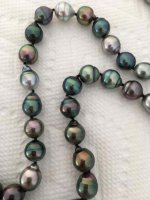 Baby Nurse's Tahitian pearl strand photos turned right side up