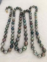 Baby Nurse's Tahitian pearl strand photos turned right side up