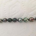 Baby Nurse's Tahitian pearl strand photos turned right side up