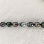 Baby Nurse's Tahitian pearl strand photos turned right side up