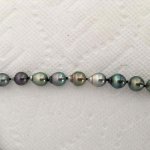 Baby Nurse's Tahitian pearl strand photos turned right side up