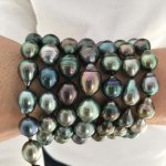 Baby Nurse's Tahitian pearl strand photos turned right side up