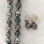 Baby Nurse's Tahitian pearl strand photos turned right side up