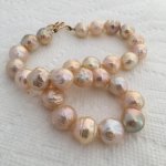 The necklace is 16.5 long and pearls range in size from 11mm to 17mm