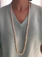 Wearing cream freshwater pearl rosebud rope from Lilia's Treasures