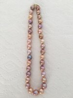 Orange and plum ripple pearls from Kojima Pearl Company