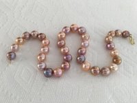 Orange and plum ripple pearls from Kojima Pearl Company