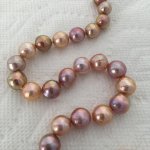 The strand is 18 long and the pearls are 9-11mm - Kojima