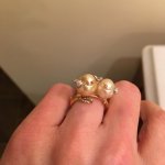 the ring is the love birds ring from Rio Pearl