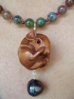 Ojime bead with CFWP acorn pendant.jpg