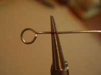 Grasp wire at red mark as shown.jpg