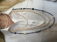 a mash up of my 9mm WSS (my wedding pearls, a 50 inch 6mm akoya rope, my metallic 36 inch FWP, and a sapphire and FWP necklace of my own creation