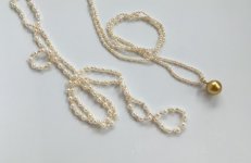 tiny pearl chain is made up of Vietnamese Akoya pearls and Akoya keshi