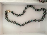 Intense peacock Tahitian pearl necklace.jpg