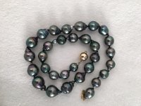 pearl paradise tahitian circled pearl strand.jpg