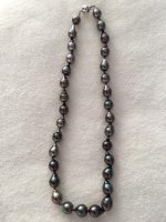 Aubergine baroque Tahitian pearl strand.jpg