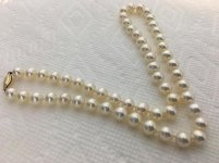  The strand is 18 and the pearls in it are 7-7.5mm