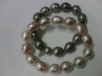 2 metallic FW Tah bracelets.jpg