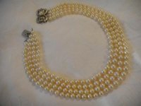 4 strand vintage ocean pearl necklace.jpg