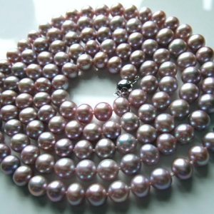 Lavender Purple.
39.5 inch rope of 8mm. - 8.5mm. freshwater pearls in lavender purple colours with metallic lustre