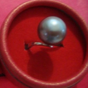 2. Blackish grey south Sea ring size 8, set in Silver