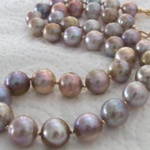 Large Golden Pond Slime Lavender Purples Freshwater Pearls. These were for my site. I wasn't going to keep them. Really I wasn't. No, really. I just tried them on and I was lost!