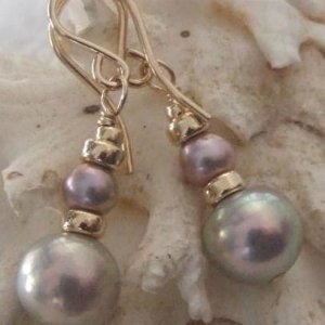 Golden purple metallic earrings to match necklace.