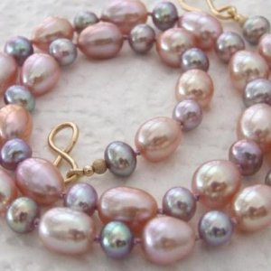 PinkLilacRiceDropsWithSmallPurpleBaroqueNecklace - 18inch, drops 12x9mm, baroques 6mm. Very pretty and Summery.