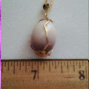 Natural pearl found in the waters off Eastern Long Island.  The pearl is 13.39mm x 18.5mm and the weight is 21ct.