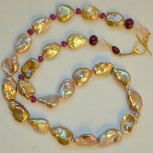 Pondslimes from Sarah with rubies, rose quartz and vermeil toggle from Nina Design