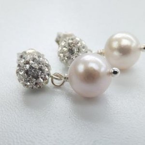 Akoya pearl earrings on pave crystal studs