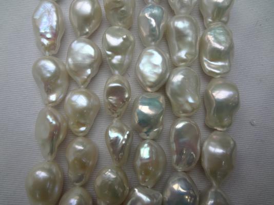 13-14mm white  nucleated pearl strands