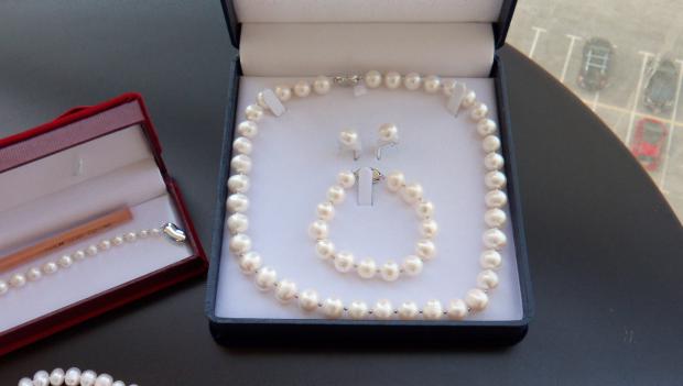 Added 7 new pearls to this necklace today - pearls about 12mm Freshwater HK - silver clasp with base metal bottom