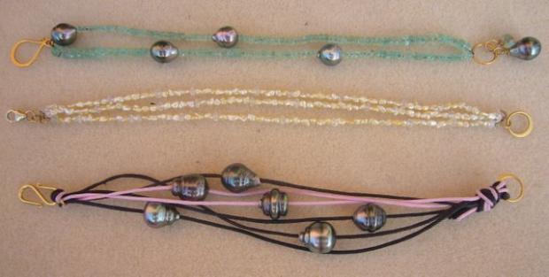 bracelets, from the top: Emerald with Tahitians, Akoya keshi with morganite, waxed cotton with Tahitians.