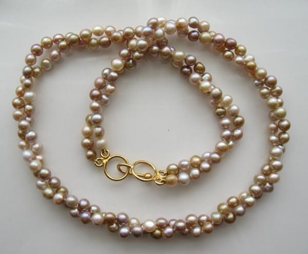 One of my favorites.  Tiny natural color freshwater pearls.