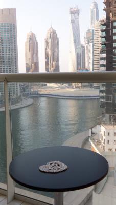 Room with a (pearl) view - view from balcony into Dubai Marina - humidity about 70c here and on the 9th floor. Love my new long set of HK freshwater pearls.