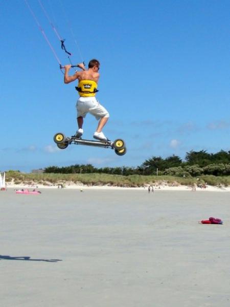 Same board as the one pictured on the "windflex" photo. I'm using a kiteboarding kite instead of a windsurfing sail.